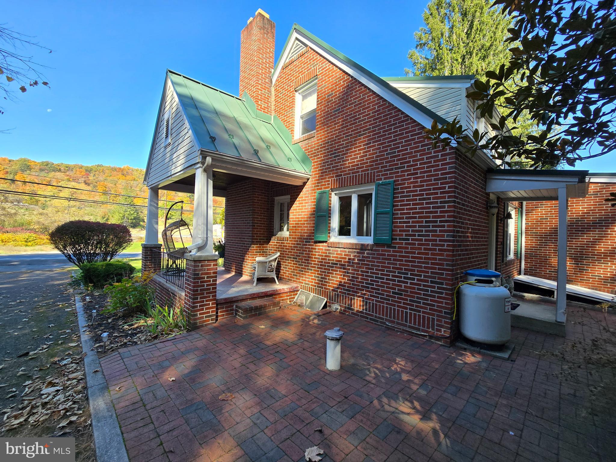1945 Valley Road Berkeley Springs, WV 25411 - Photo 56 of 60 Patio/side porch; propane tank is owned