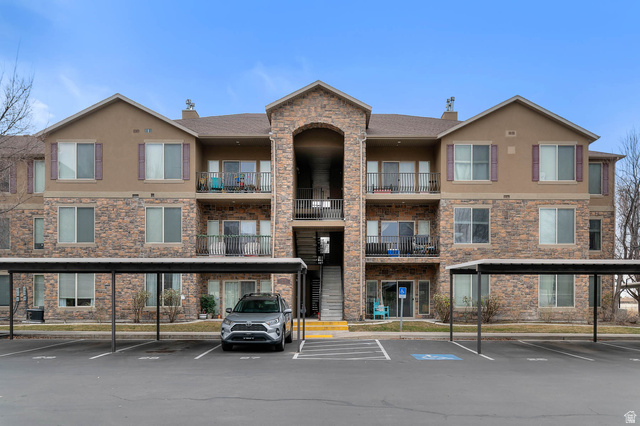476 West 200 N Street, Unit 206 Springville, UT 84663 - Photo 22 of 24 View of apartment building / complex with covered parking
