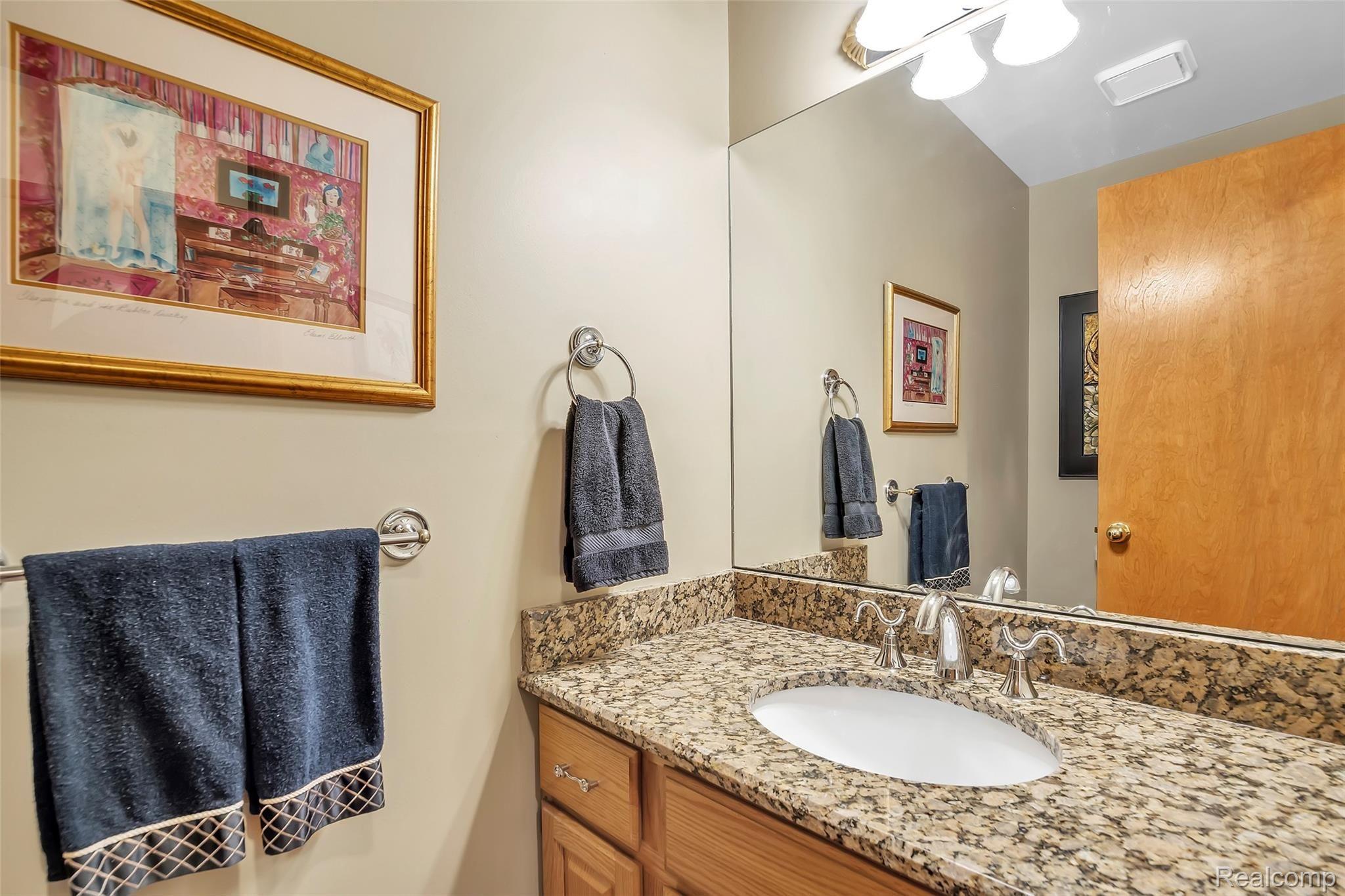 13413 White Lake Road Fenton, MI 48430 - Photo 13 of 27 Half Bath with Granite - directly off Living Room and Kitchen.
