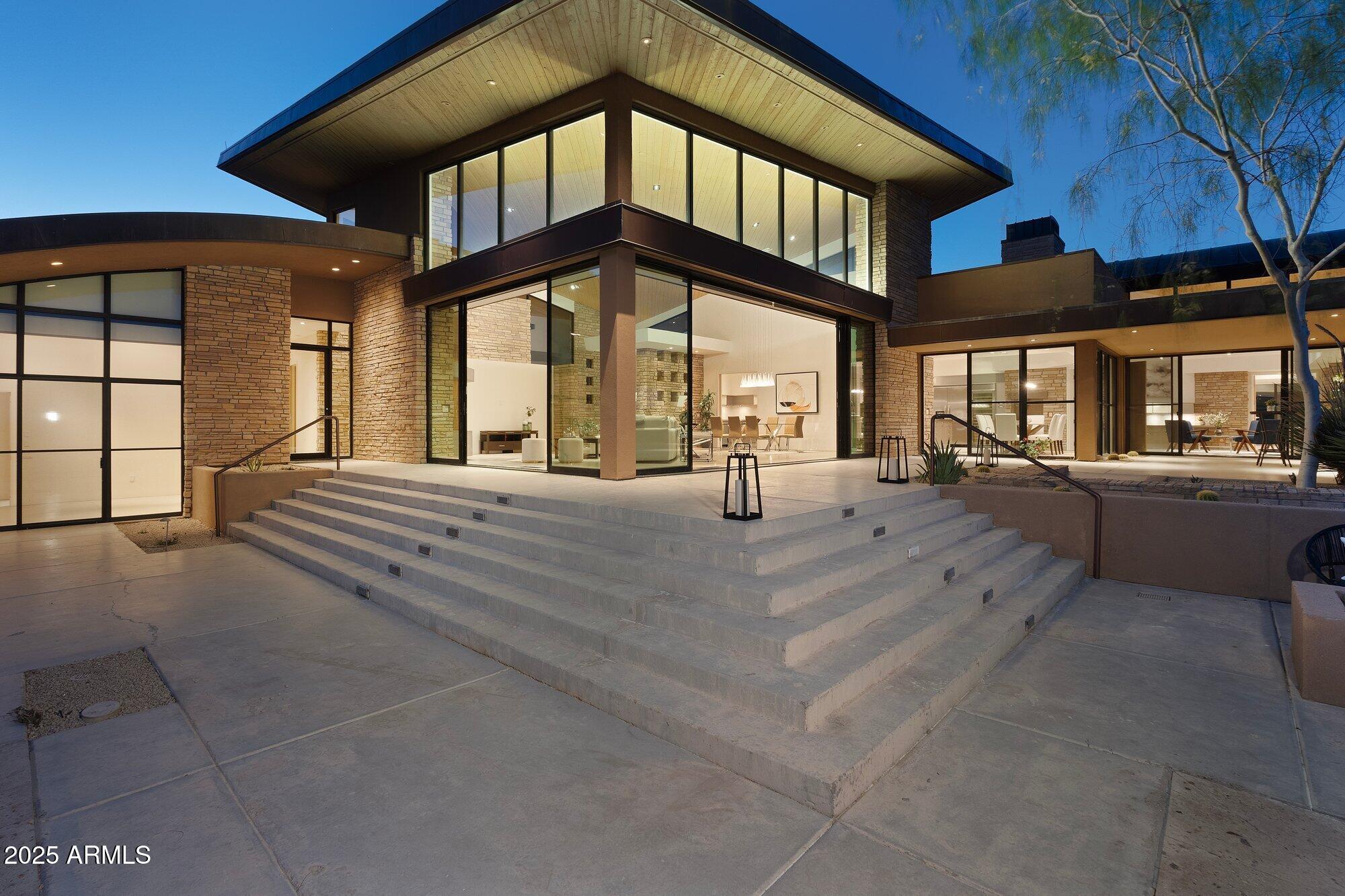 9626 East Aw Tillinghast Road Scottsdale, AZ 85262 - Photo 4 of 28 a view of a building with a porch