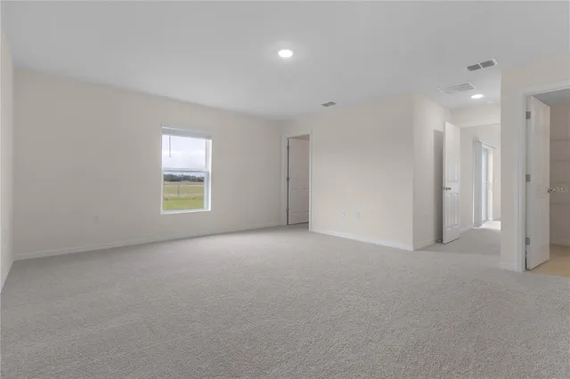 a kitchen with stainless steel appliances granite countertop a sink and stove top oven