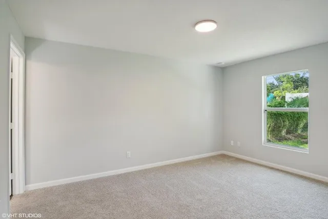 an empty room with windows