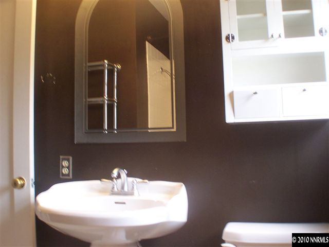 920 Bates Avenue Reno, NV 89502 - Photo 9 of 13 a bathroom with a sink and a mirror