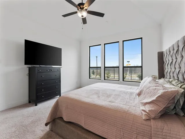 a bathroom with a toilet sink and shower