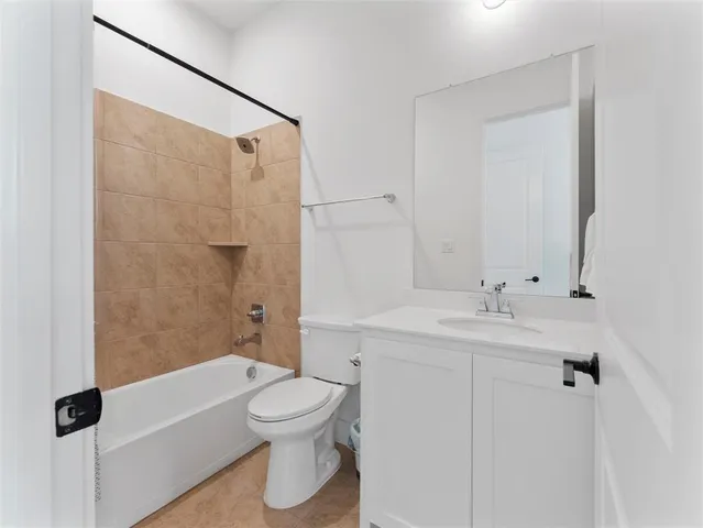 a house with yard in front of it