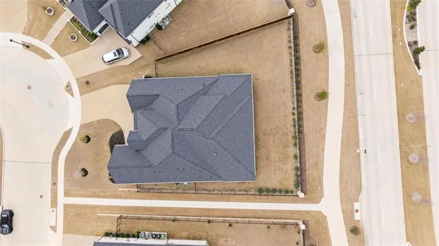 front view of a house with a street