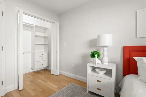a room with furniture and a lamp