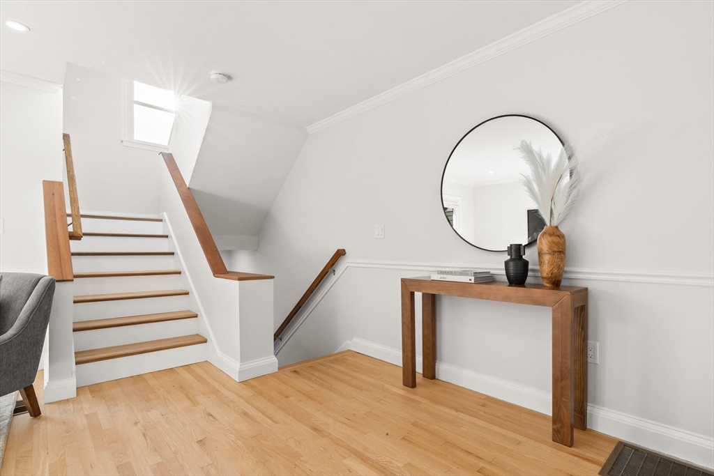 713-715 East 7th Street, Unit 715 Boston, MA 02127 - Photo 9 of 25 a view of a livingroom with furniture