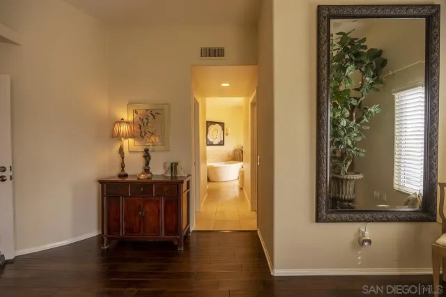 a bathroom with a tub and shower