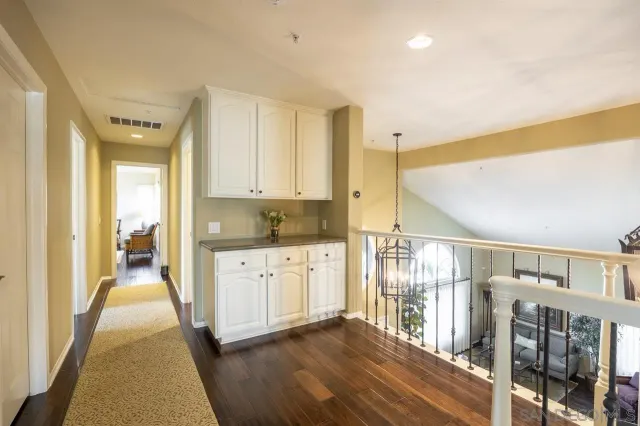 a bedroom with a bed and furniture