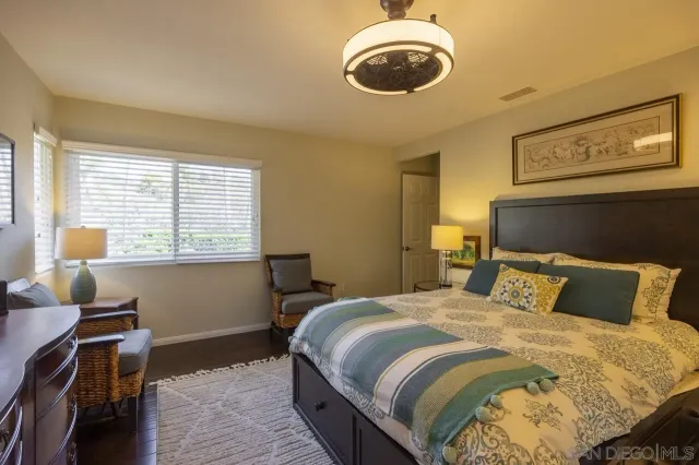 a bathroom with a double vanity sink mirror and vanity