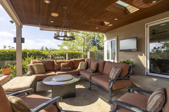 a outdoor living space with furniture and garden view