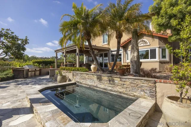 a view of a patio with swimming pool