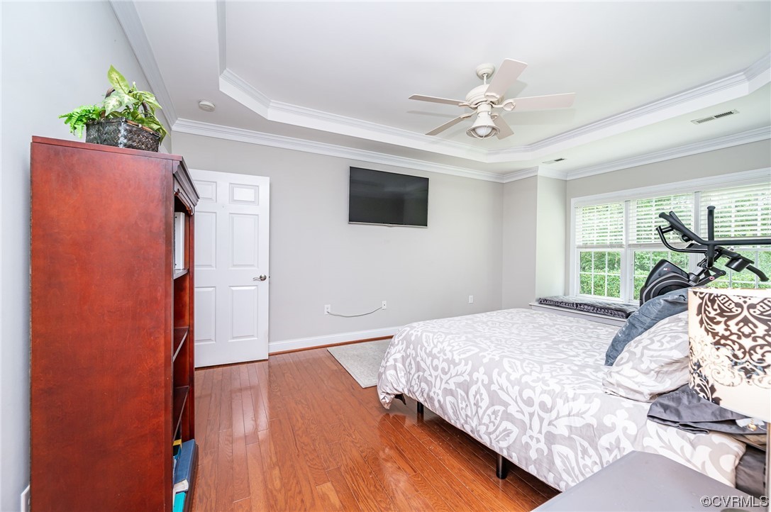 5080 Park Commons Loop Glen Allen, VA 23059 - Photo 13 of 41 a bedroom with furniture and a window