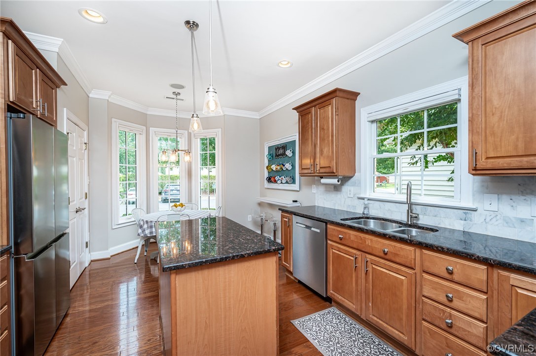 5080 Park Commons Loop Glen Allen, VA 23059 - Photo 25 of 41 a kitchen with stainless steel appliances granite countertop a sink stove and refrigerator