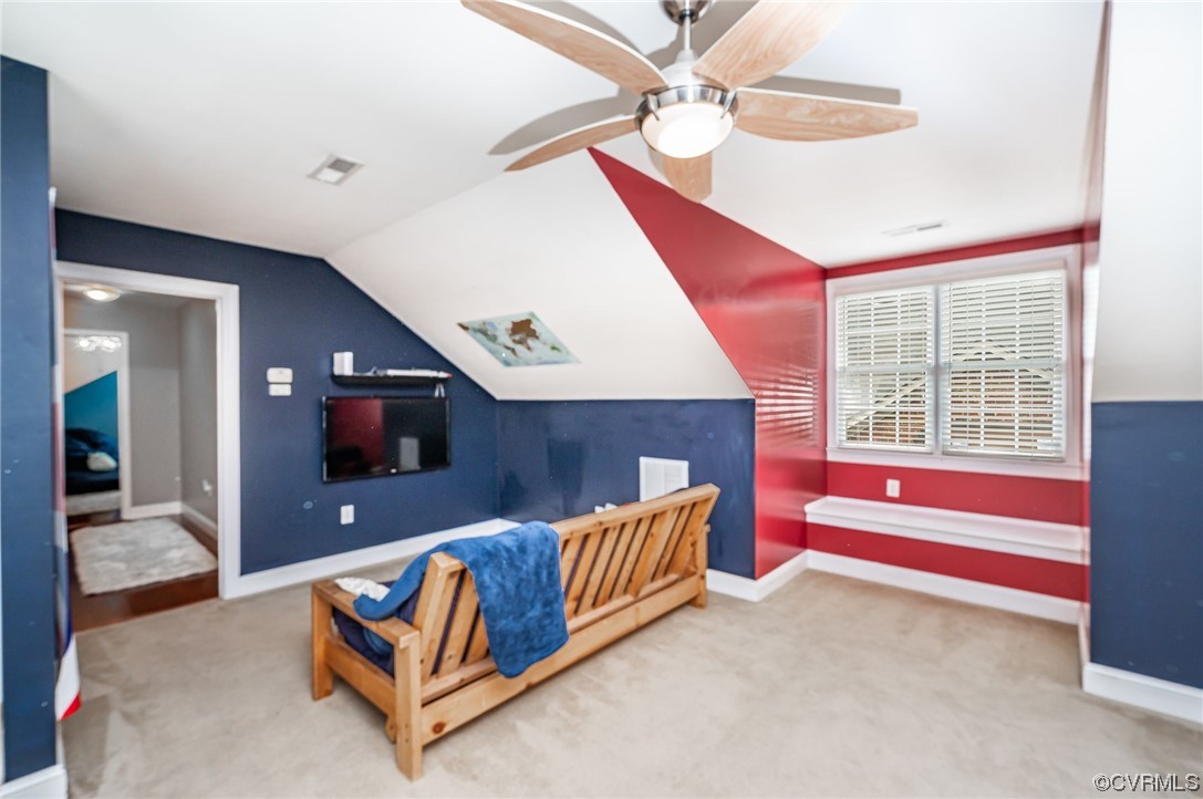 5080 Park Commons Loop Glen Allen, VA 23059 - Photo 30 of 41 a spacious bedroom with a bed and a chandelier