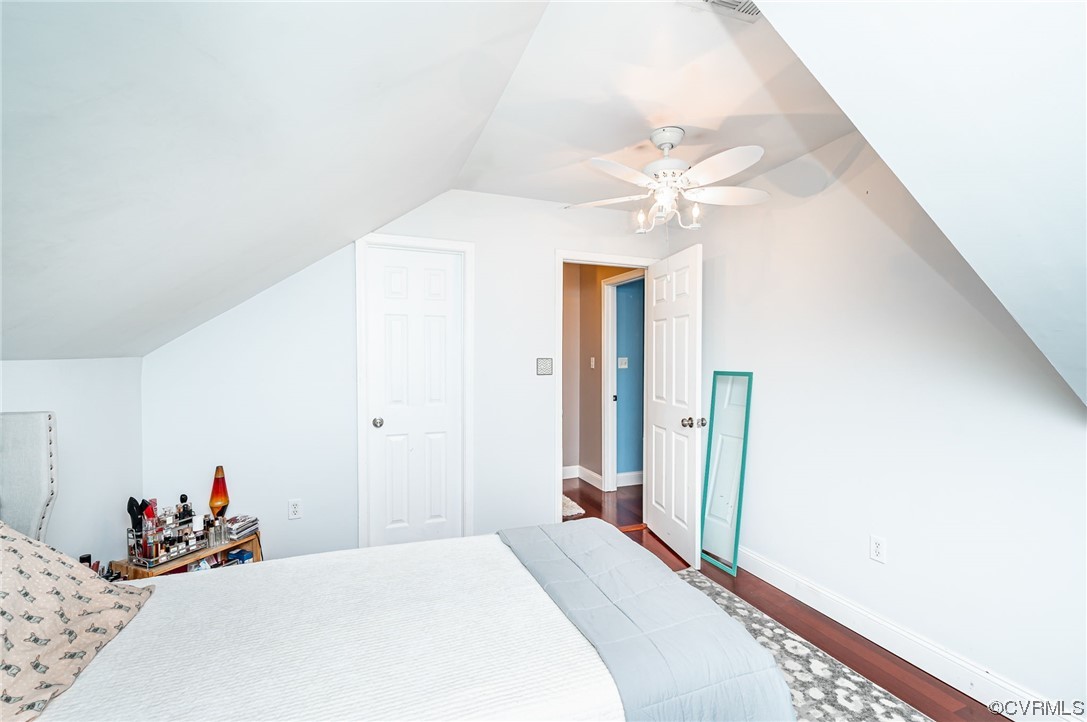 5080 Park Commons Loop Glen Allen, VA 23059 - Photo 33 of 41 a bedroom with a bed and a chandelier