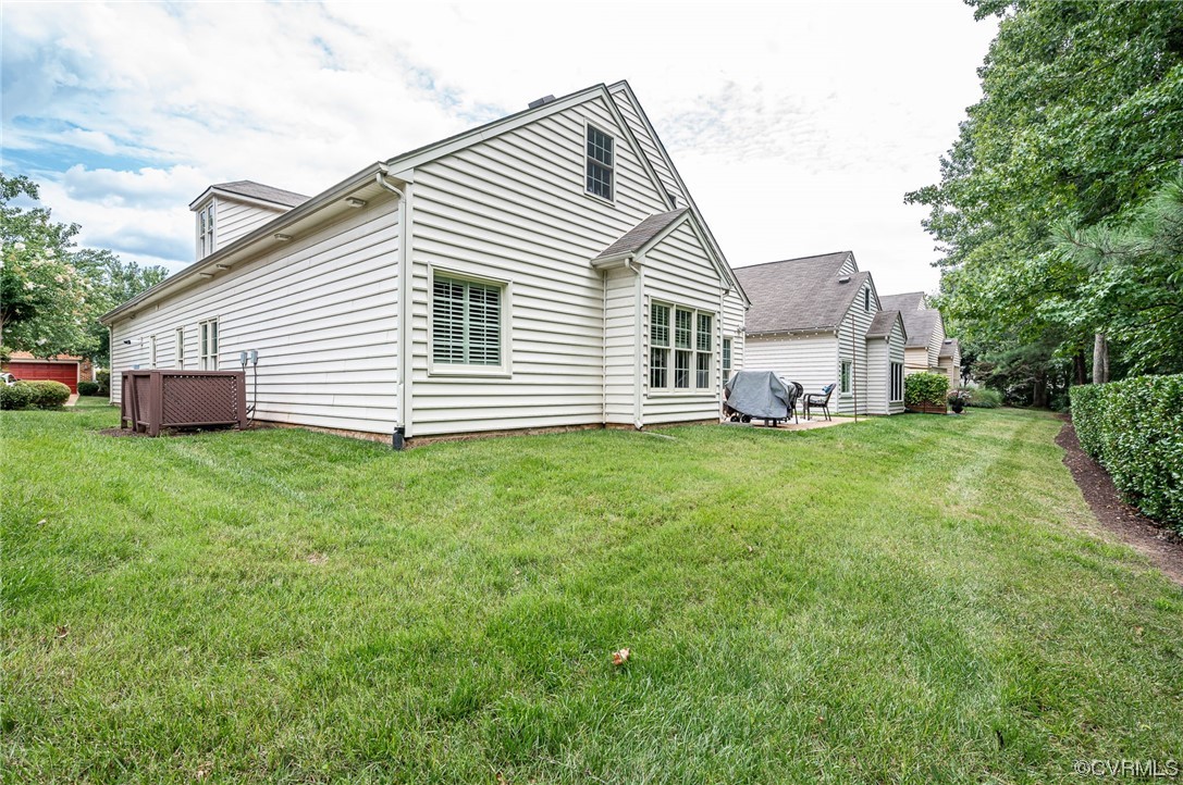 5080 Park Commons Loop Glen Allen, VA 23059 - Photo 41 of 41 a front view of a house with a yard and garage