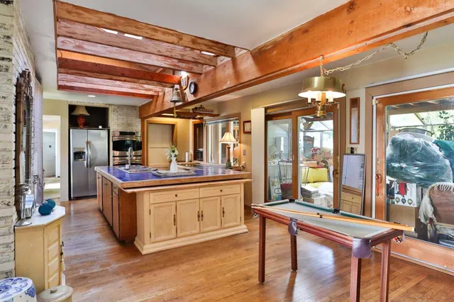 a bathroom with a sink double vanity and a mirror