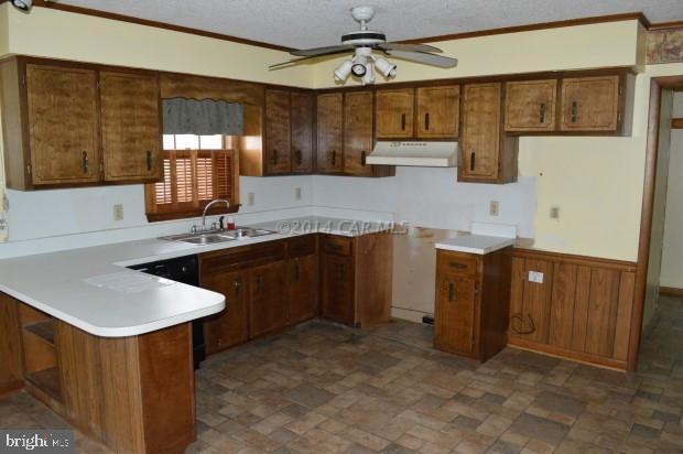 6485 Bent Pine Road Willards, MD 21874 - Photo 6 of 15 a kitchen with sink cabinets and window