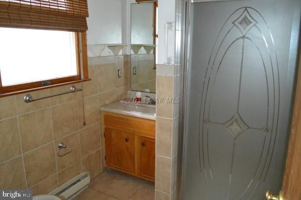 6485 Bent Pine Road Willards, MD 21874 - Photo 9 of 15 a bathroom with a shower and a sink