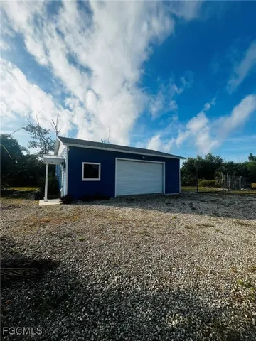 a house view with a garden space
