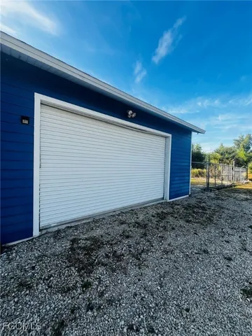 a view of a yard with an outdoor space