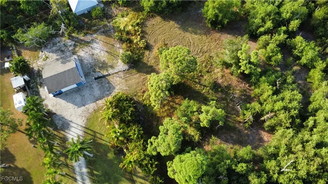 a view of barbeque area with seating