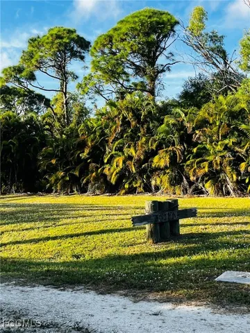 a view of a yard with an outdoor space