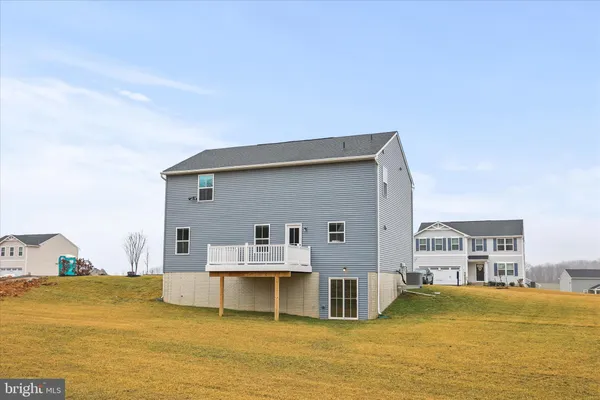 a view of house with ocean view
