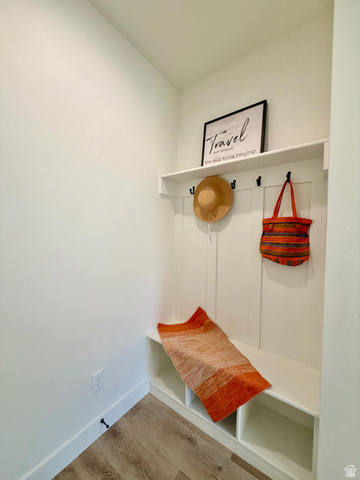 905 Settlement Canyon Road Tooele, UT 84074 - Photo 7 of 12 Built-in mudroom bench with three storage cubbies, four coat hooks, and an upper shelf