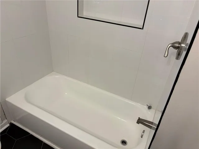 a bathroom with a bathtub