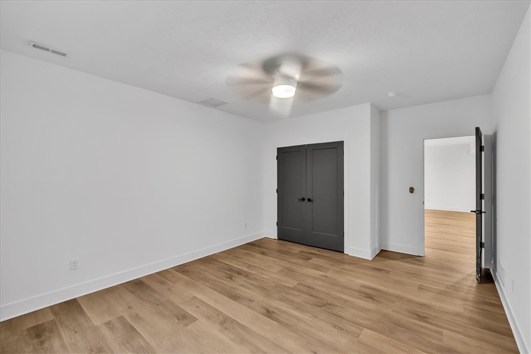 908 Declaration Drive Savoy, IL 61874 - Photo 39 of 41 a view of an empty room and wooden floor