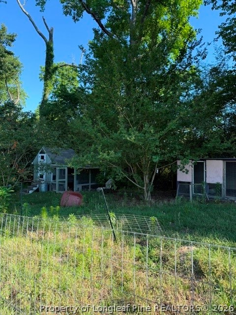 1284 L Cooper Road Cameron, NC 28326 - Photo 24 of 24 a view of a house with a yard