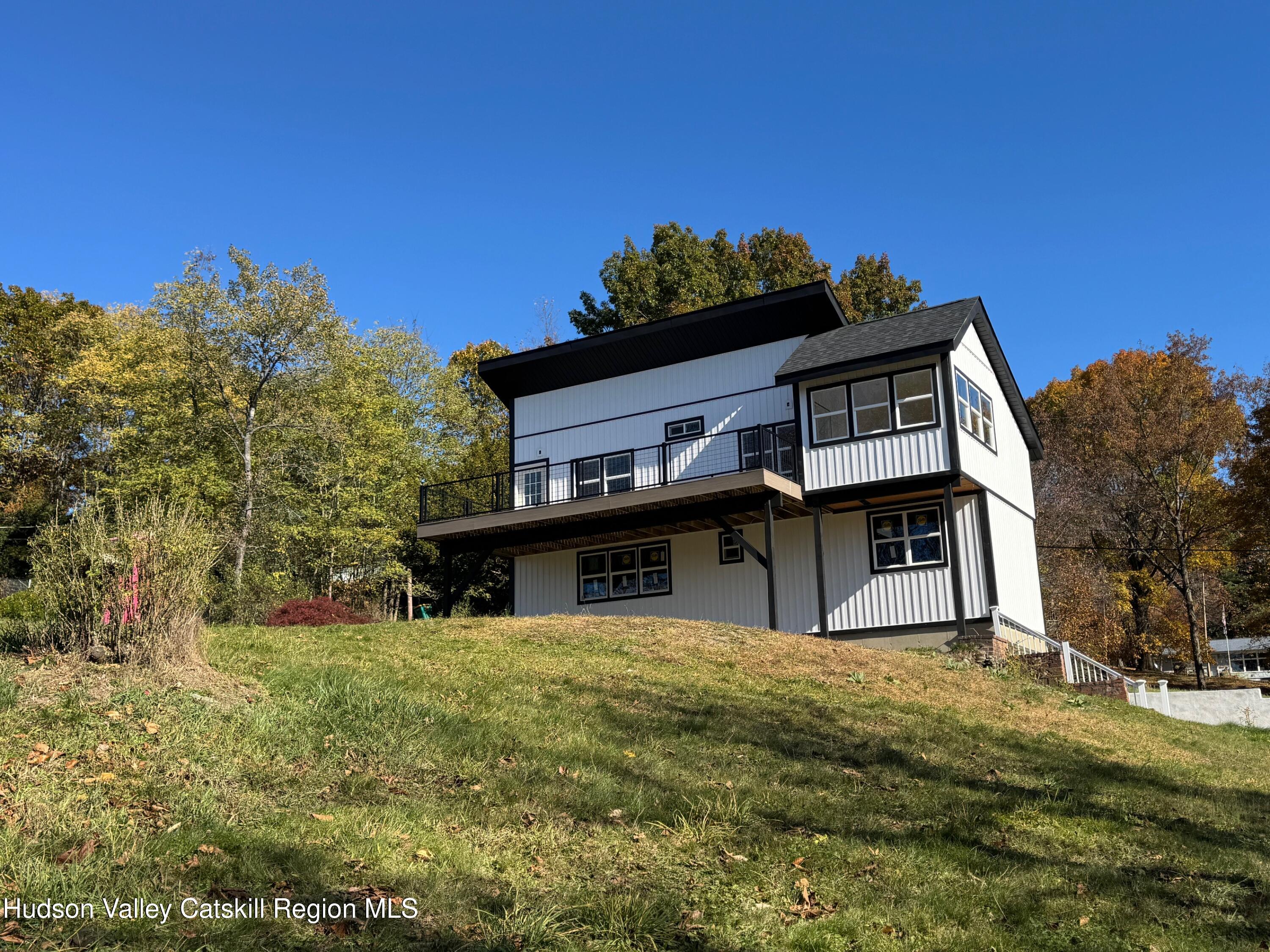 6 Wang Road Craryville, NY 12521 - Photo 3 of 39 a house view with a outdoor space