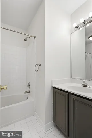 a view of an empty room with stairs