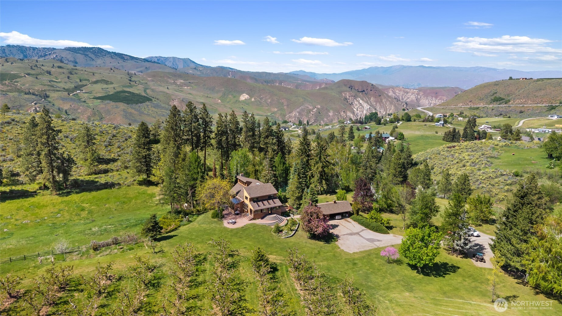 712 Moonlit Lane Wenatchee, WA 98801 - Photo 1 of 29 a view of a town with mountains in the background