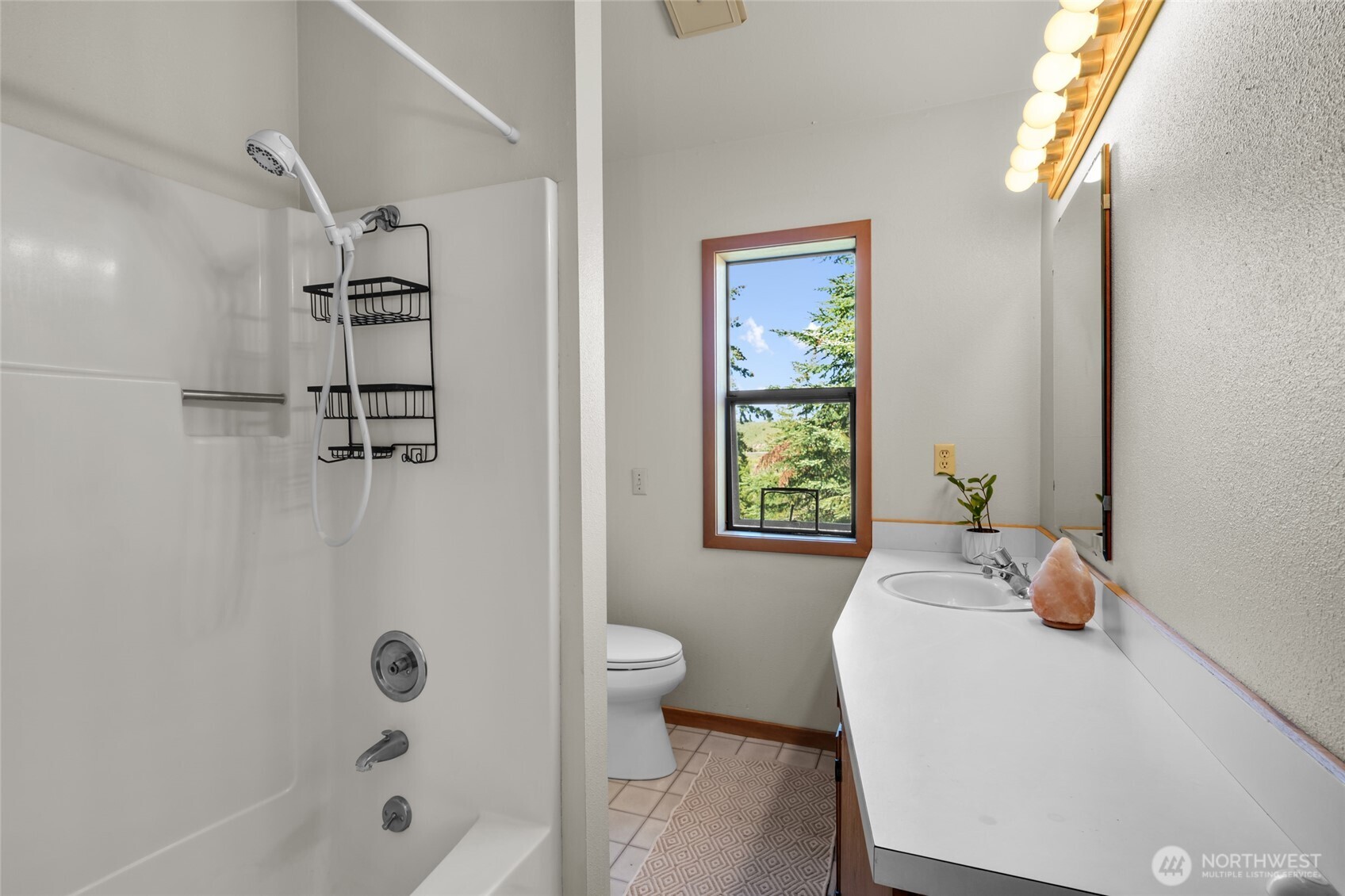 712 Moonlit Lane Wenatchee, WA 98801 - Photo 14 of 29 a bath room with a bath tub and a shower