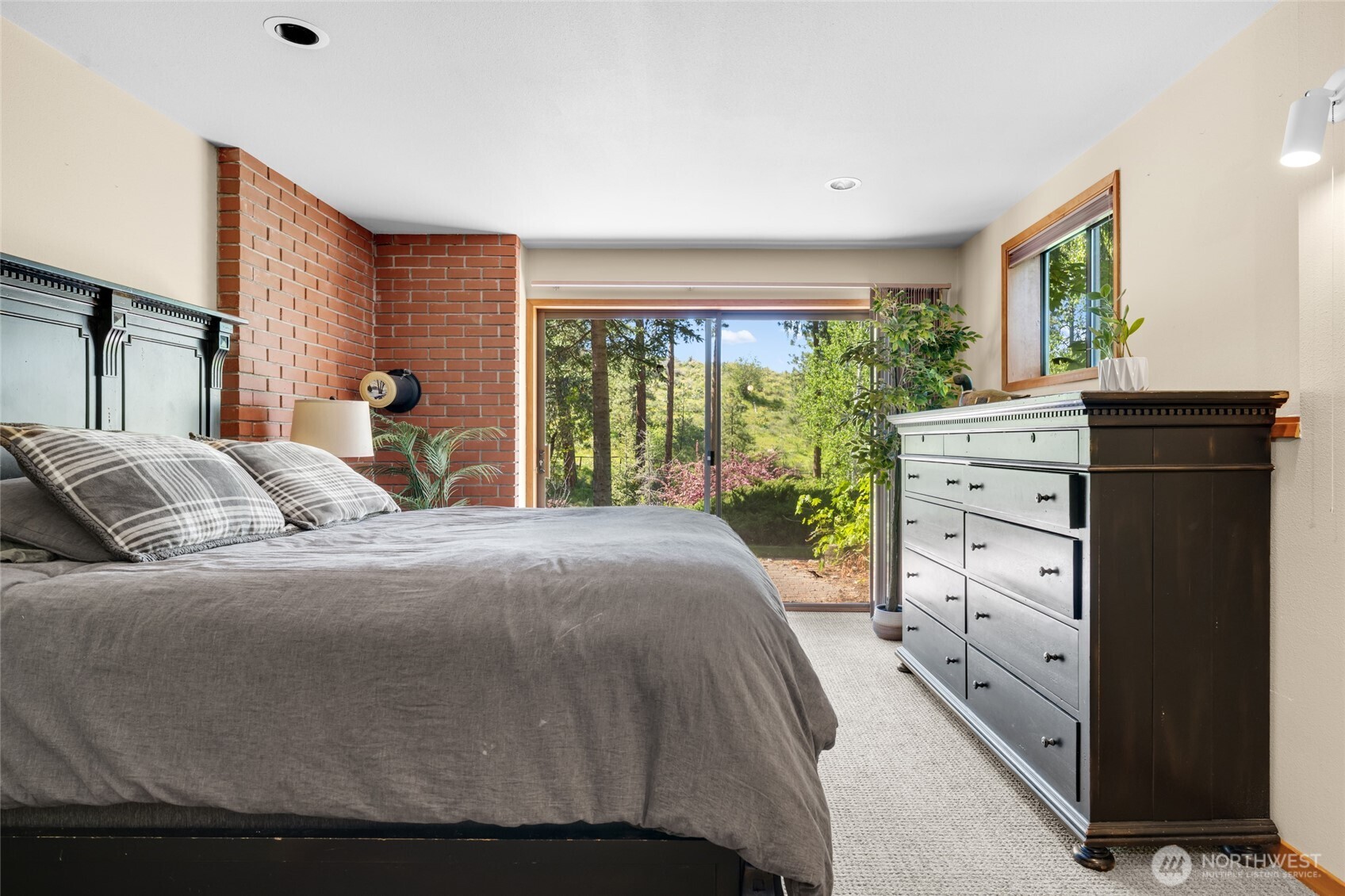 712 Moonlit Lane Wenatchee, WA 98801 - Photo 15 of 29 a bed room with a bed and a window