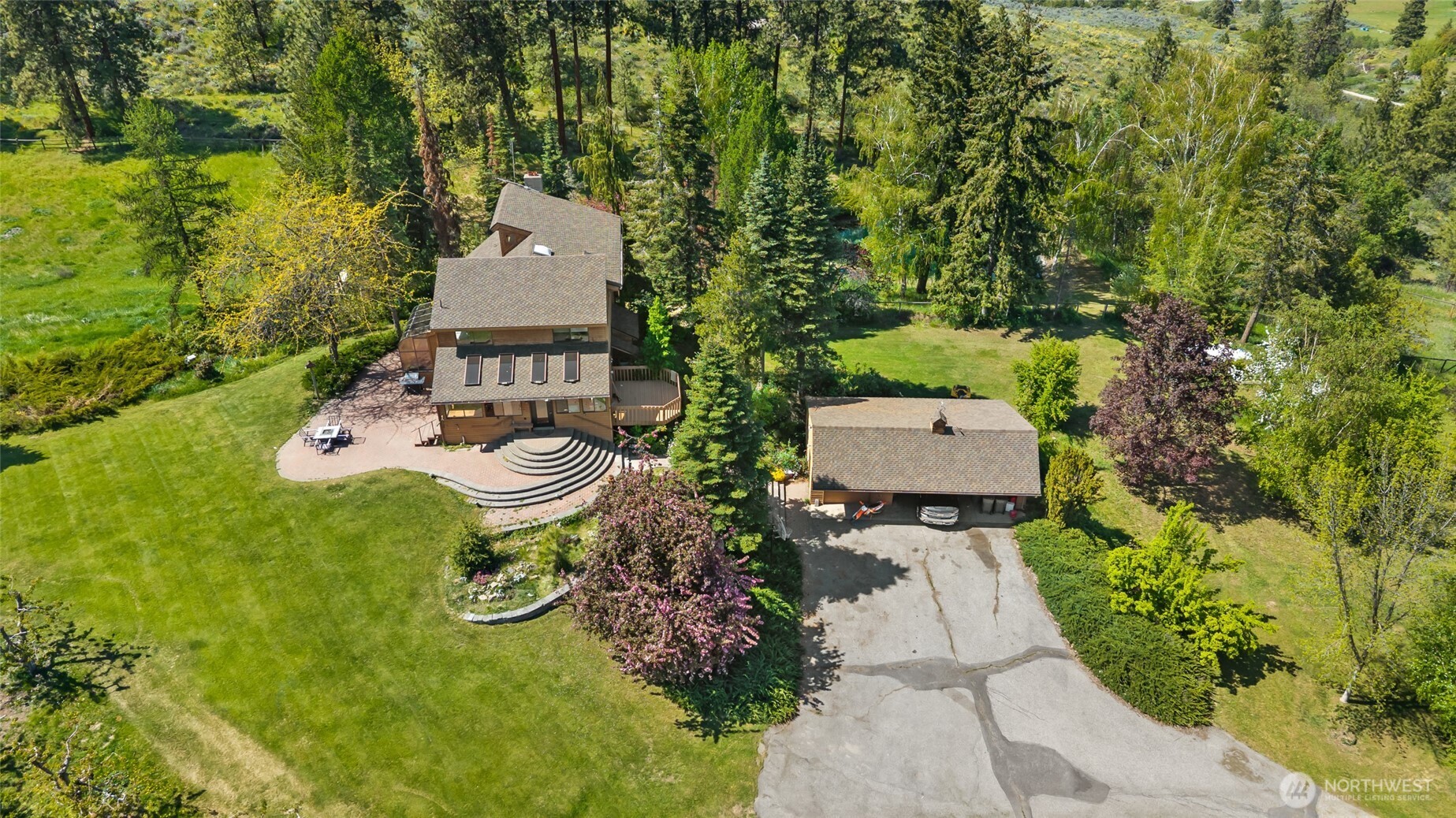 712 Moonlit Lane Wenatchee, WA 98801 - Photo 3 of 29 an aerial view of a house with garden space and street view