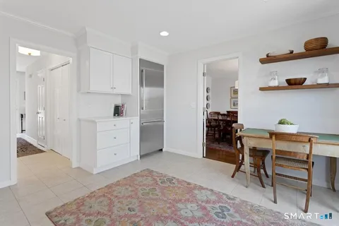 a view of a workspace with furniture