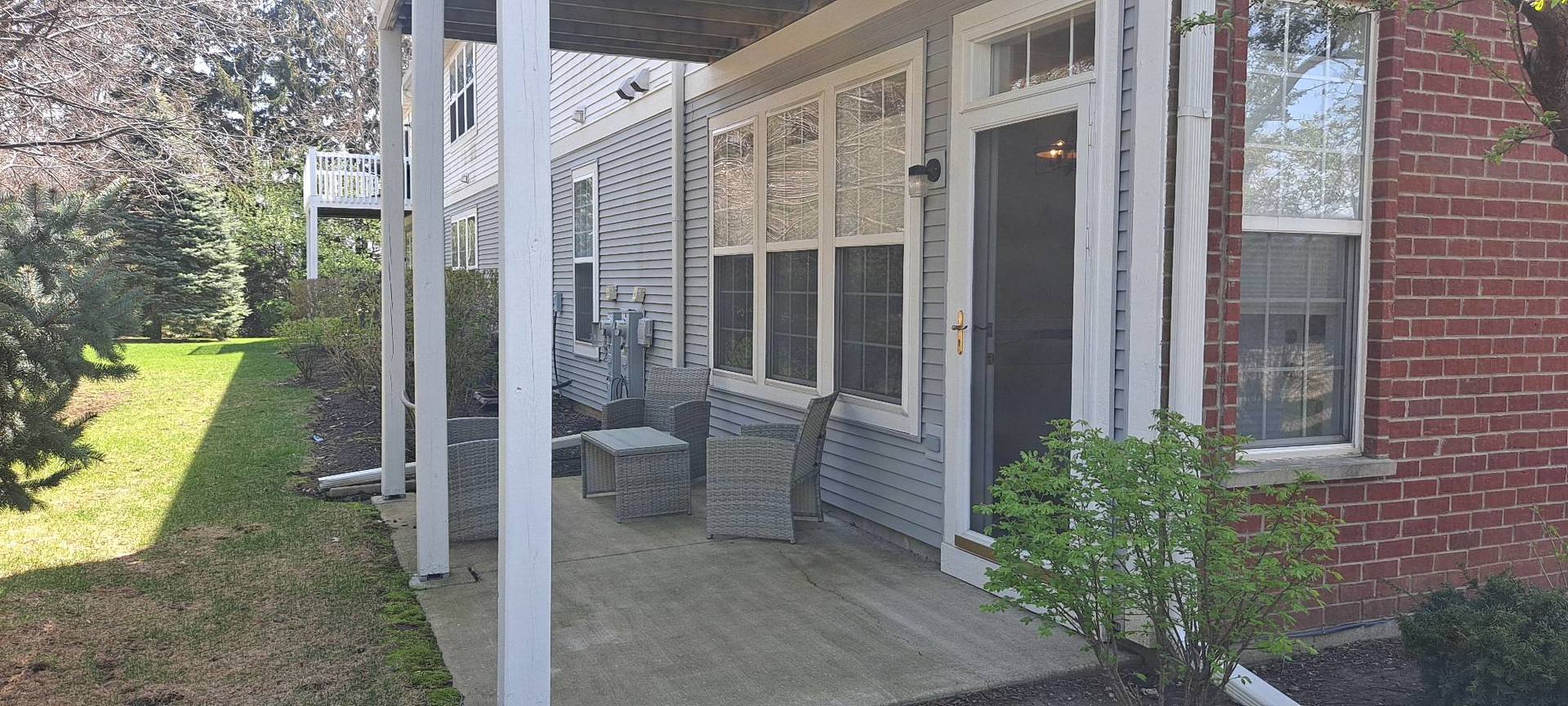 1501 Millbrook Drive Algonquin, IL 60102 - Photo 18 of 19 front view of a house with a tub