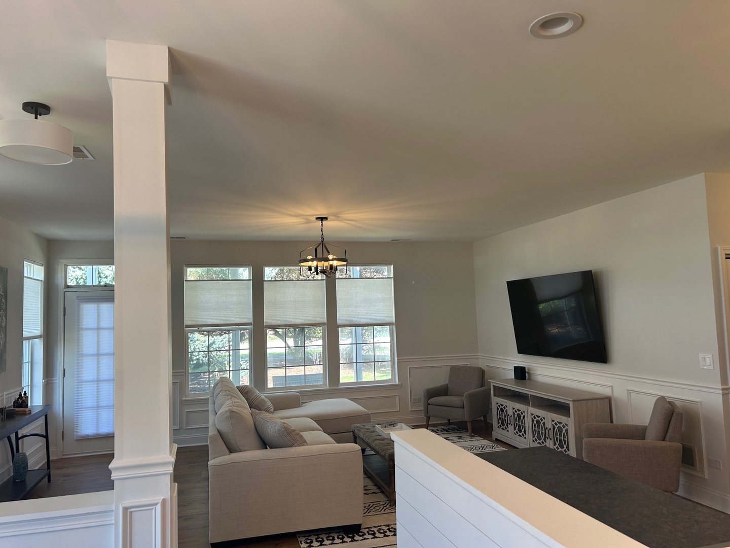 1501 Millbrook Drive Algonquin, IL 60102 - Photo 9 of 19 a living room with furniture and a flat screen tv