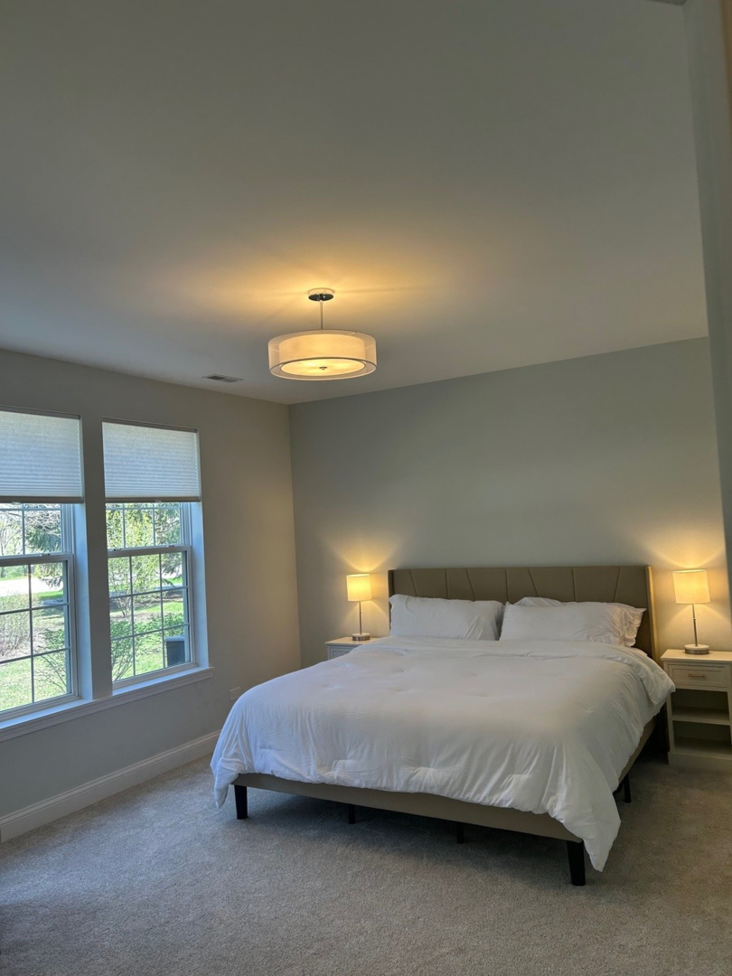1501 Millbrook Drive Algonquin, IL 60102 - Photo 10 of 19 a bedroom with a bed and window