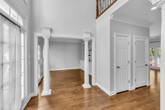 a view of entryway with wooden floor