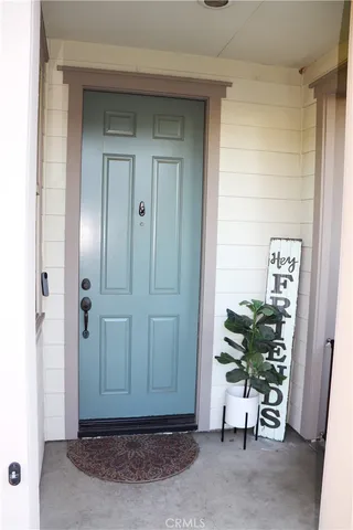 a view of entryway with wooden door