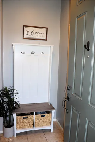 a view of a hallway with a potted plant