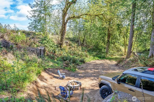 a view of a yard with an outdoor seating