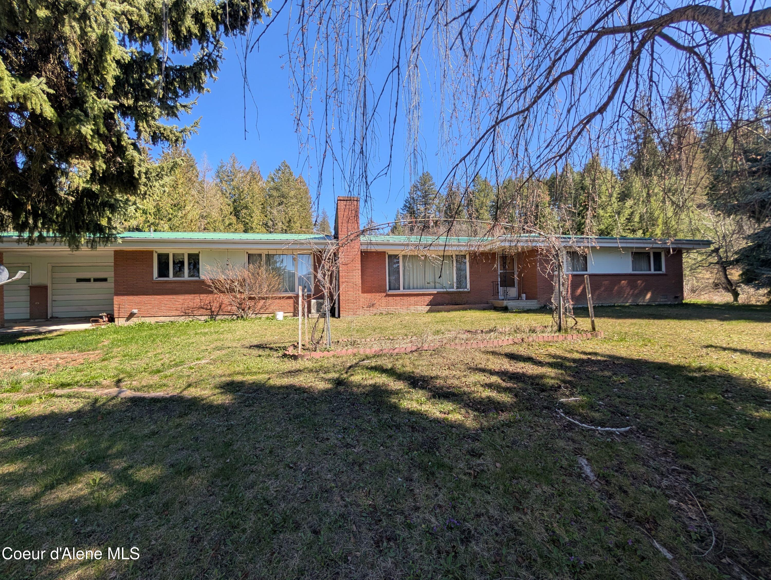 3176 Porthill Loop Bonners Ferry, ID 83805 - Photo 46 of 48 3176 New Brick side view 1