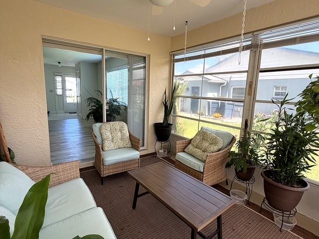 1629 Willow Run Sebring, FL 33872 - Photo 10 of 16 a living room with furniture and a potted plant